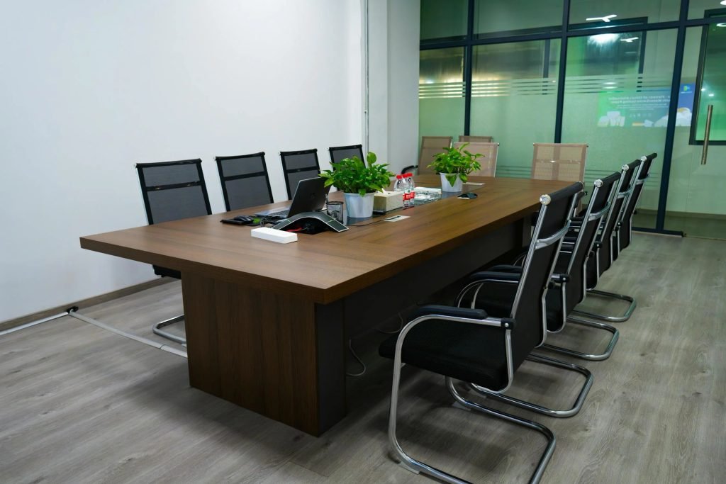 Team-oriented office layout with personal workstations and meeting area"