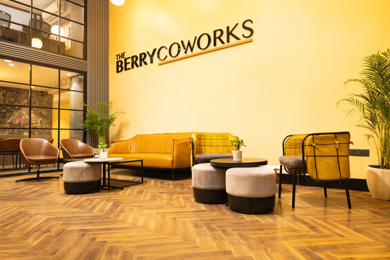 Stylish coworking space seating with modern design and plants